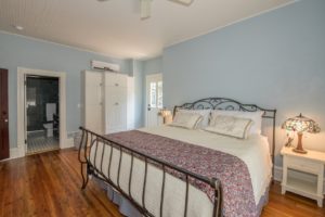 The Delphinium guest room with king bed.