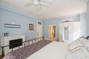 The Delphinium guest room with king bed.