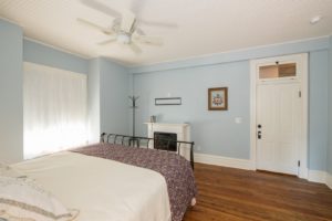 The Delphinium guest room with king bed.