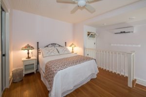 The Rose guest room with a queen bed.