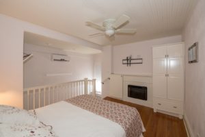 The Rose guest room with a queen bed.