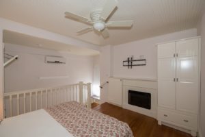 The Rose room with queen bed.