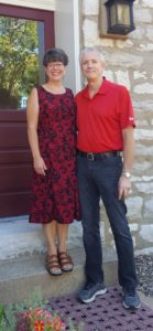 The owners of the Bed and Breakfast. Bill and Maureen Elliott stand on the office steps.